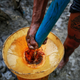 Extracting oil.